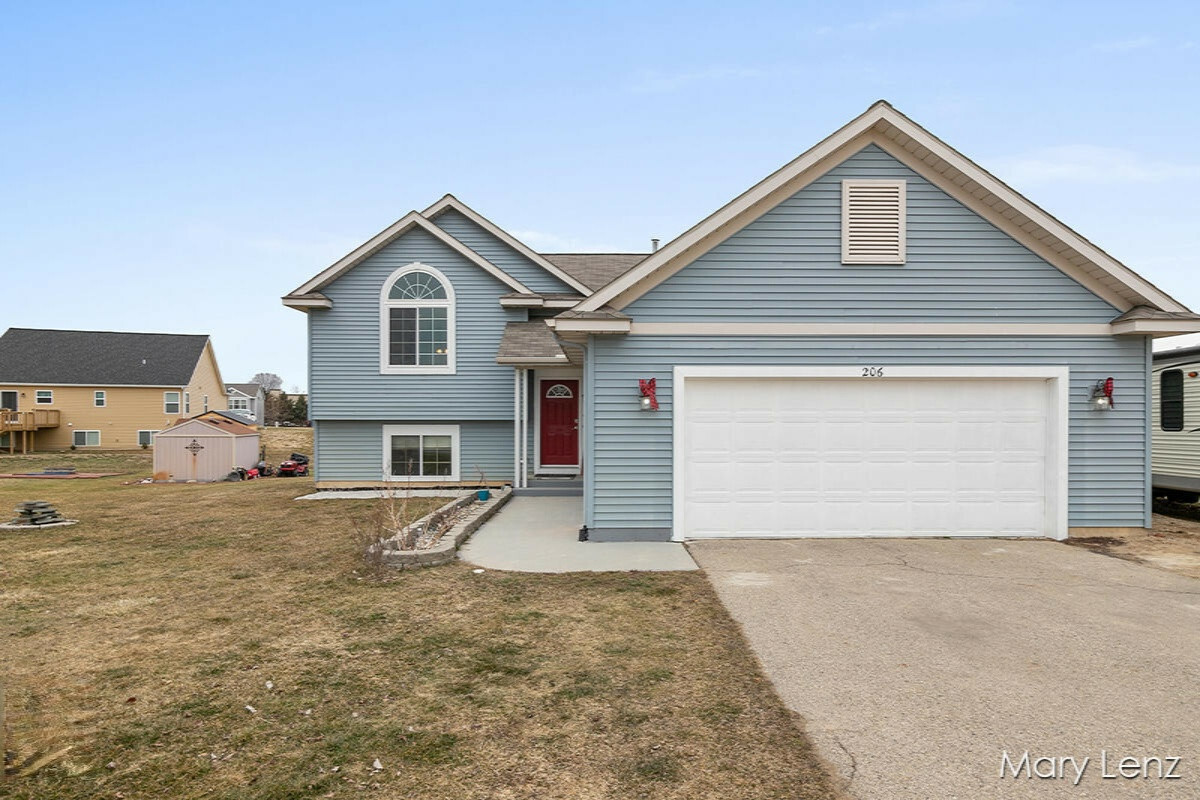 Property Photo:  206 Charyridge Drive  MI 49330 