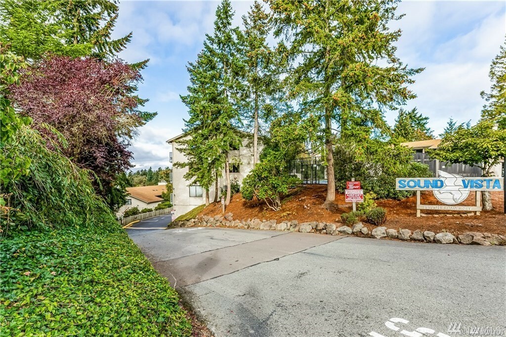 Property Photo:  13235 12th Ave SW 911  WA 98146 