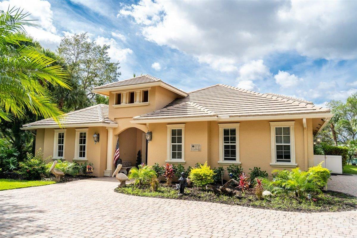 Property Photo:  111 NE Charleston Oaks Drive  FL 34983 