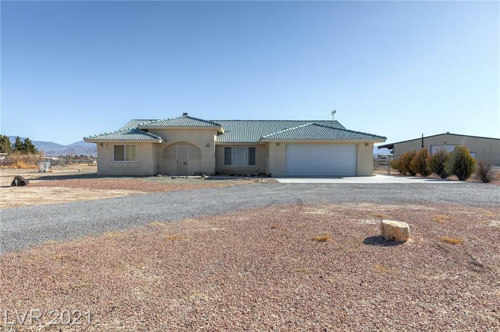 Property Photo: 9721 Oakridge Avenue NV 89048