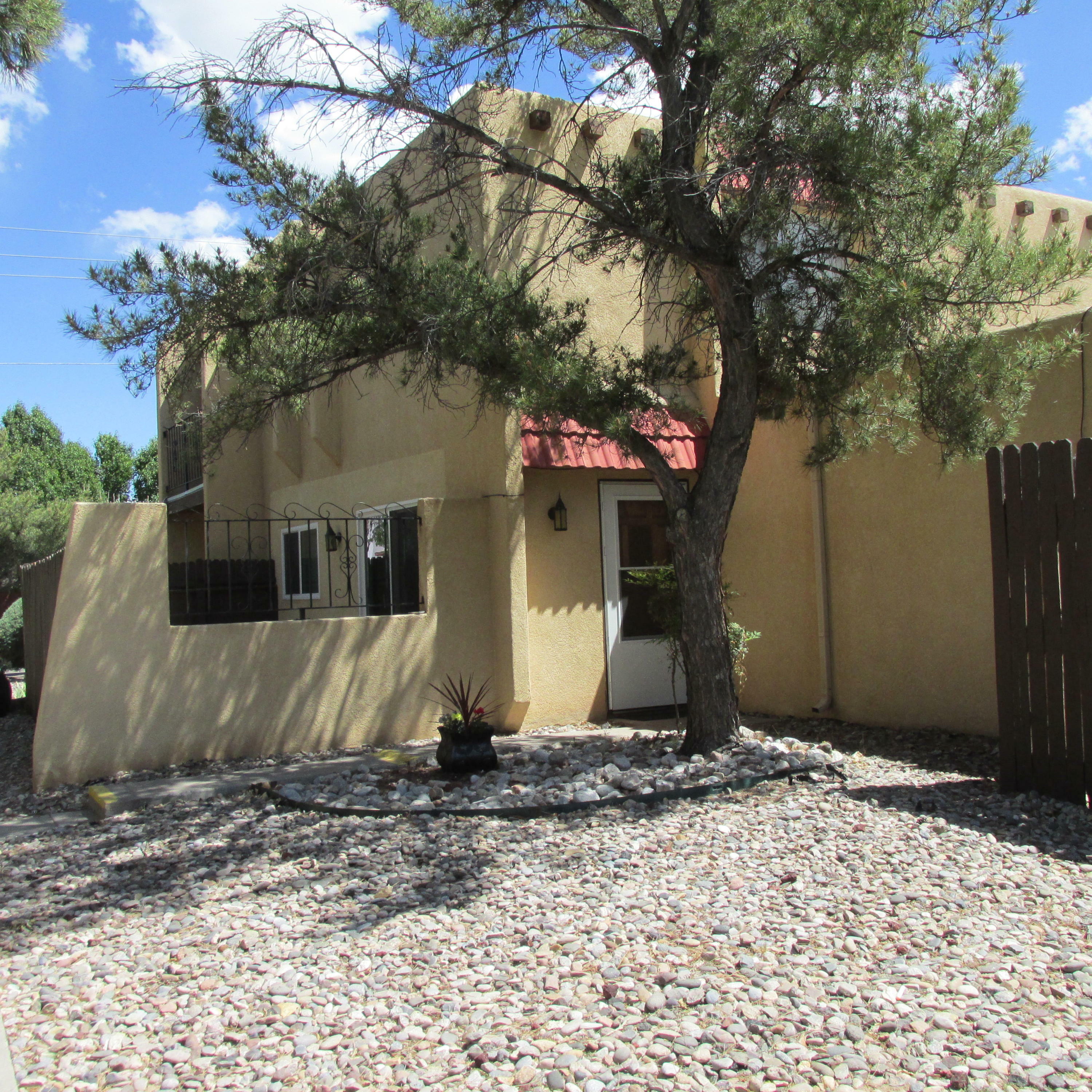 Property Photo:  5209 Camino Del Sol NE Unit  C  NM 87111 