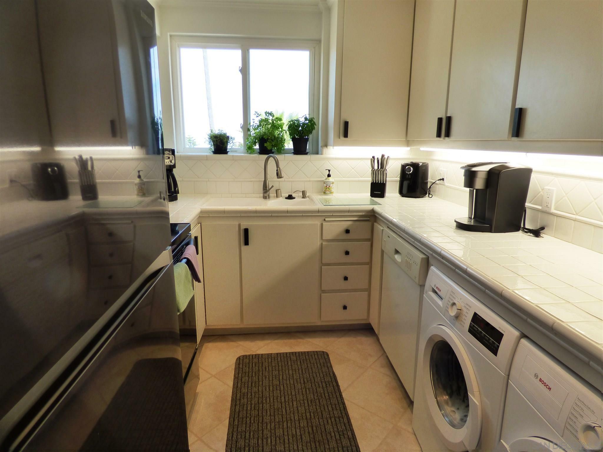 Property Photo:  8040 Girard Avenue 6  CA 92037 