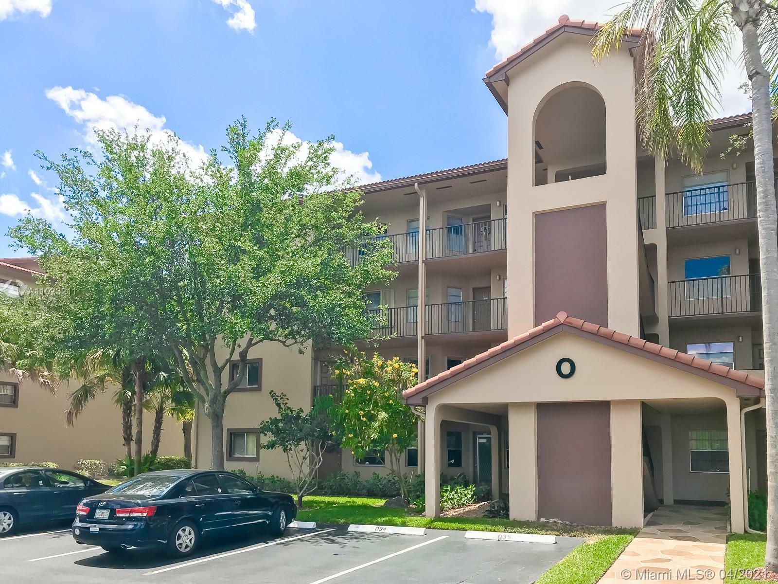 Property Photo:  1200 SW 124th Ter 401O  FL 33027 