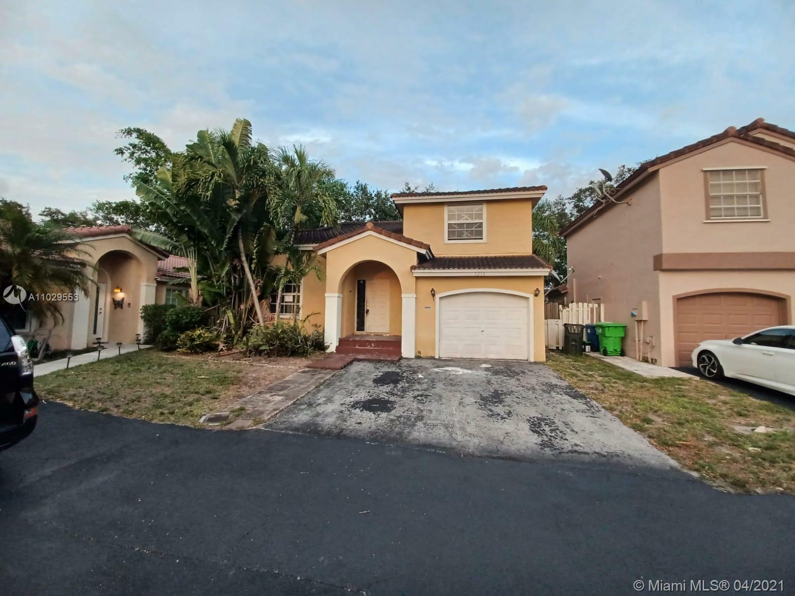 Property Photo:  1250 NW 126th Ave  FL 33323 