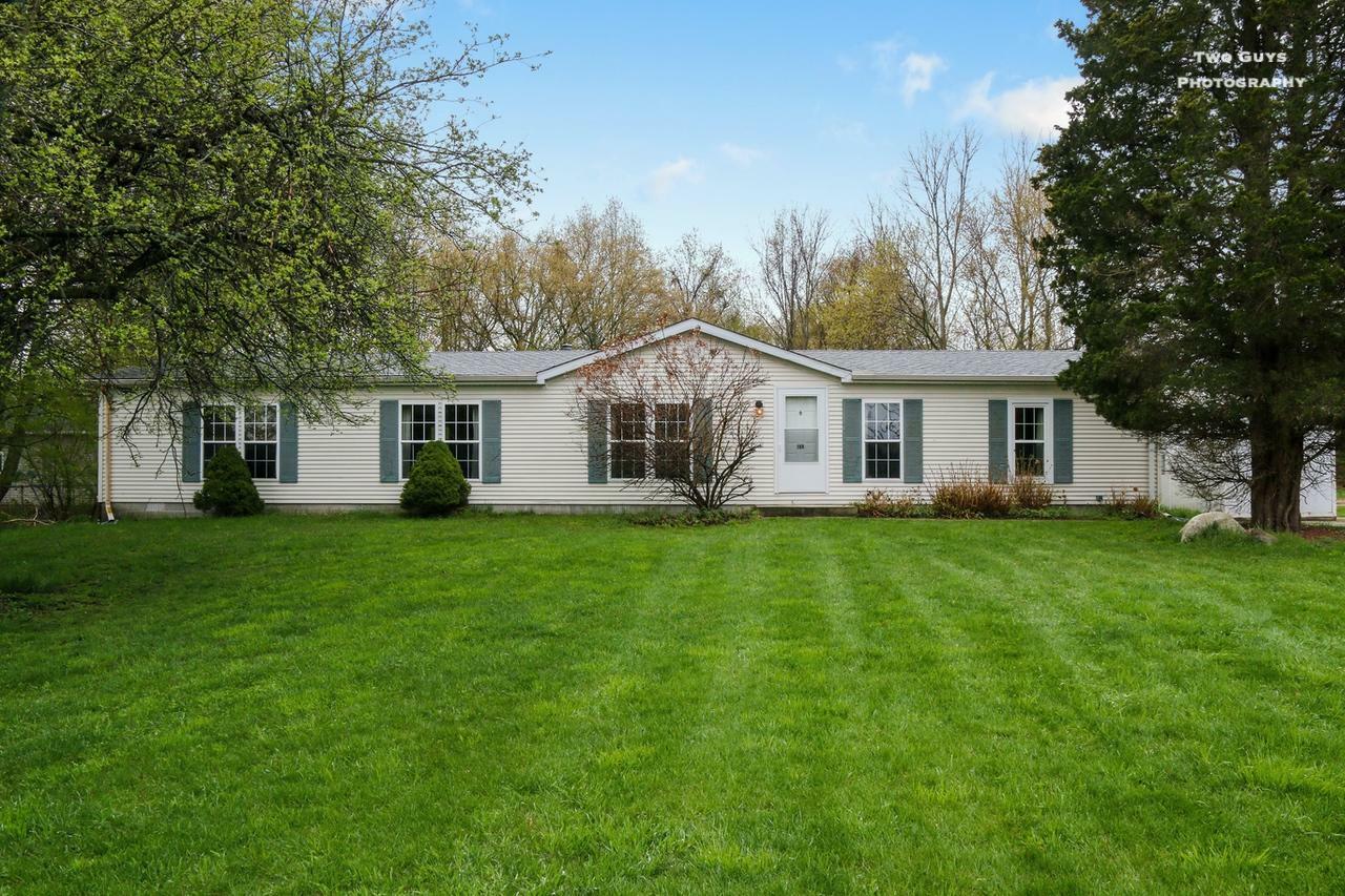 Property Photo:  169 Wiley Road  MI 49406 