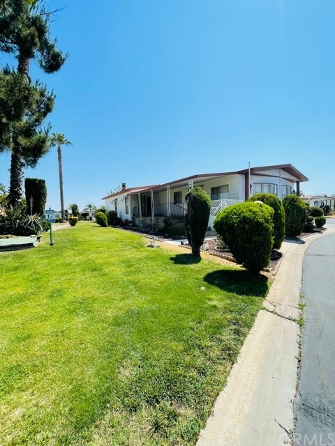 Property Photo:  23820 Ironwood Avenue 109  CA 92557 