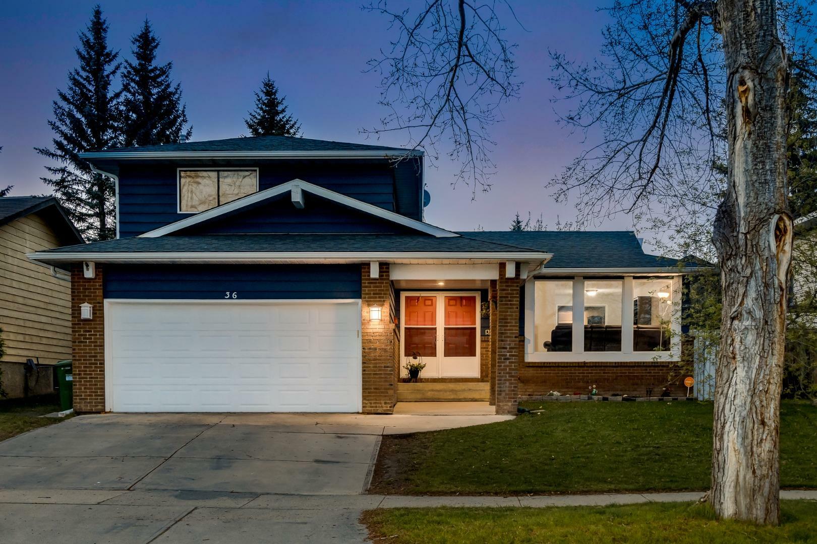 Property Photo: 36 Woodbine Boulevard SW AB T2W 4A8