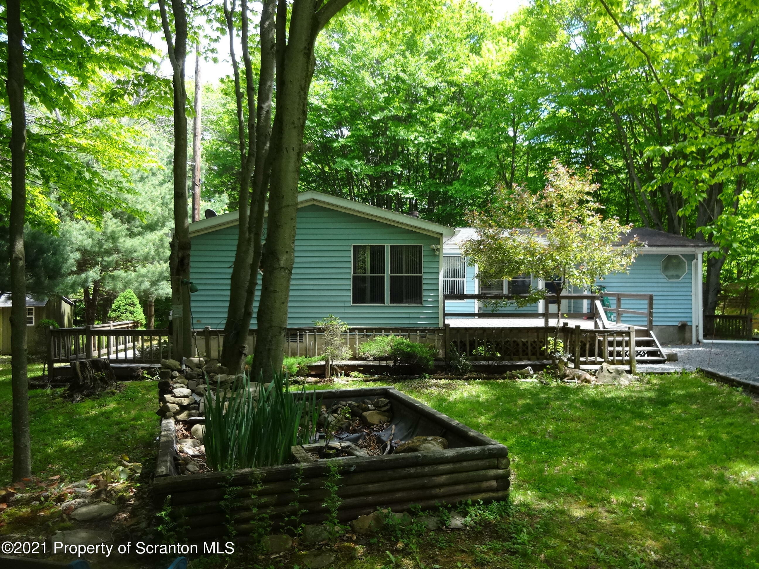 Property Photo:  48 Woodland Dr.  PA 18424 