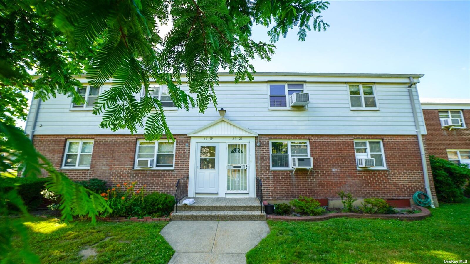 Property Photo: 67-21 Bell Boulevard Upper NY 11364