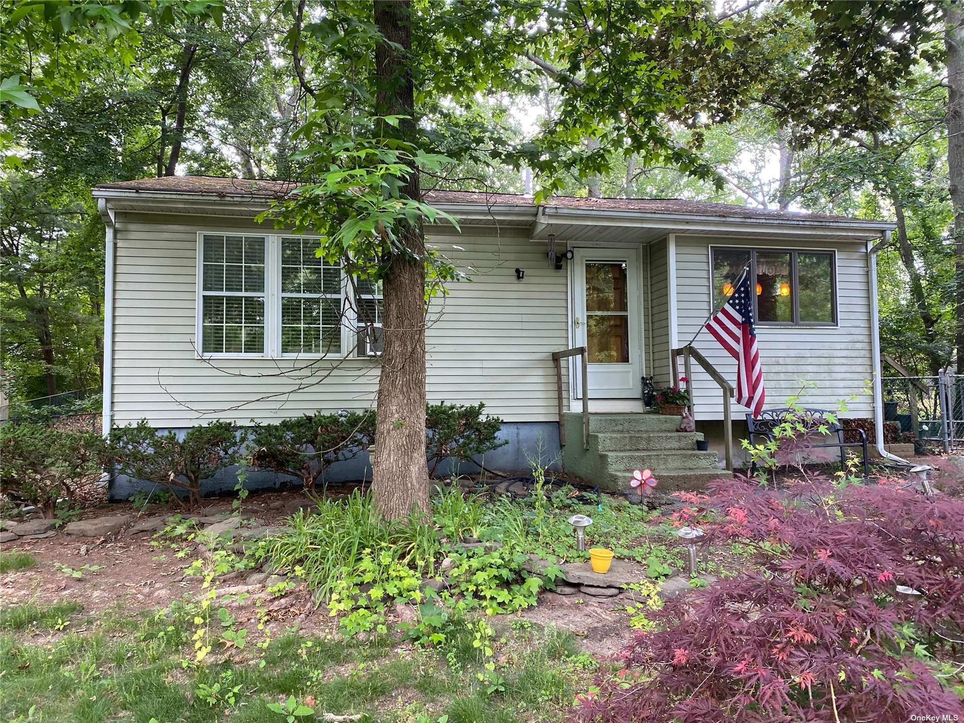 Property Photo: 58 W Bartlett Road NY 11953