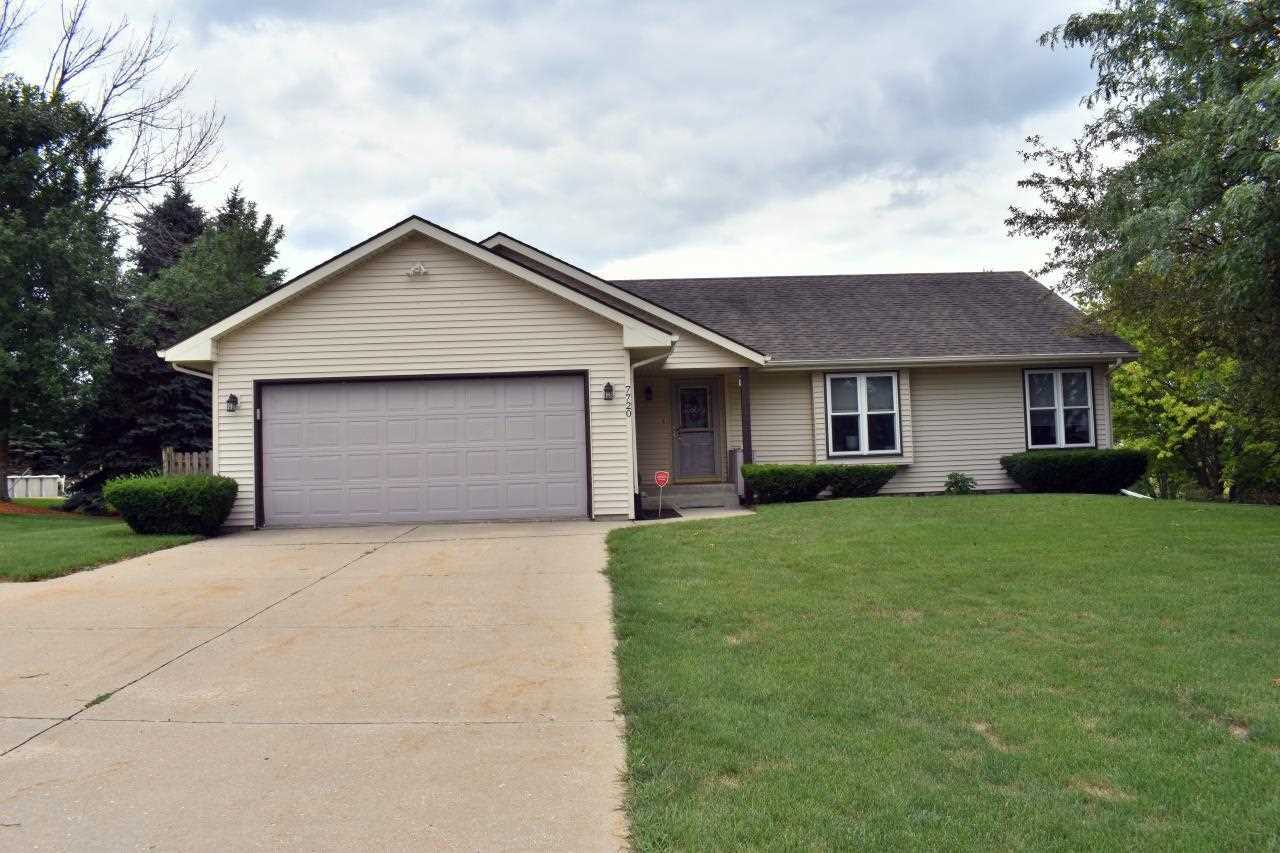 Property Photo:  7720 Coopershawk Trail  IL 61115 