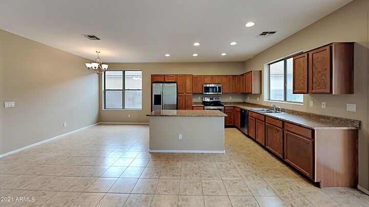 Property Photo:  10124 W Raymond Street  AZ 85353 