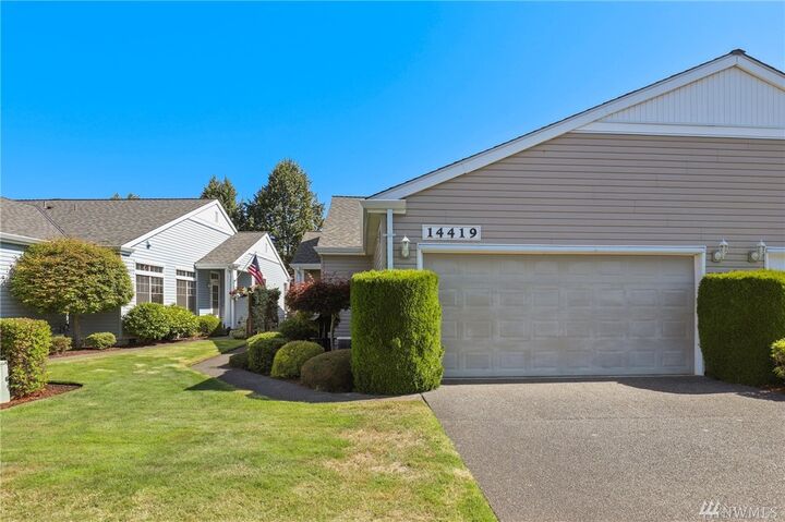 Property Photo:  14419 Riverwalk Dr E  WA 98390