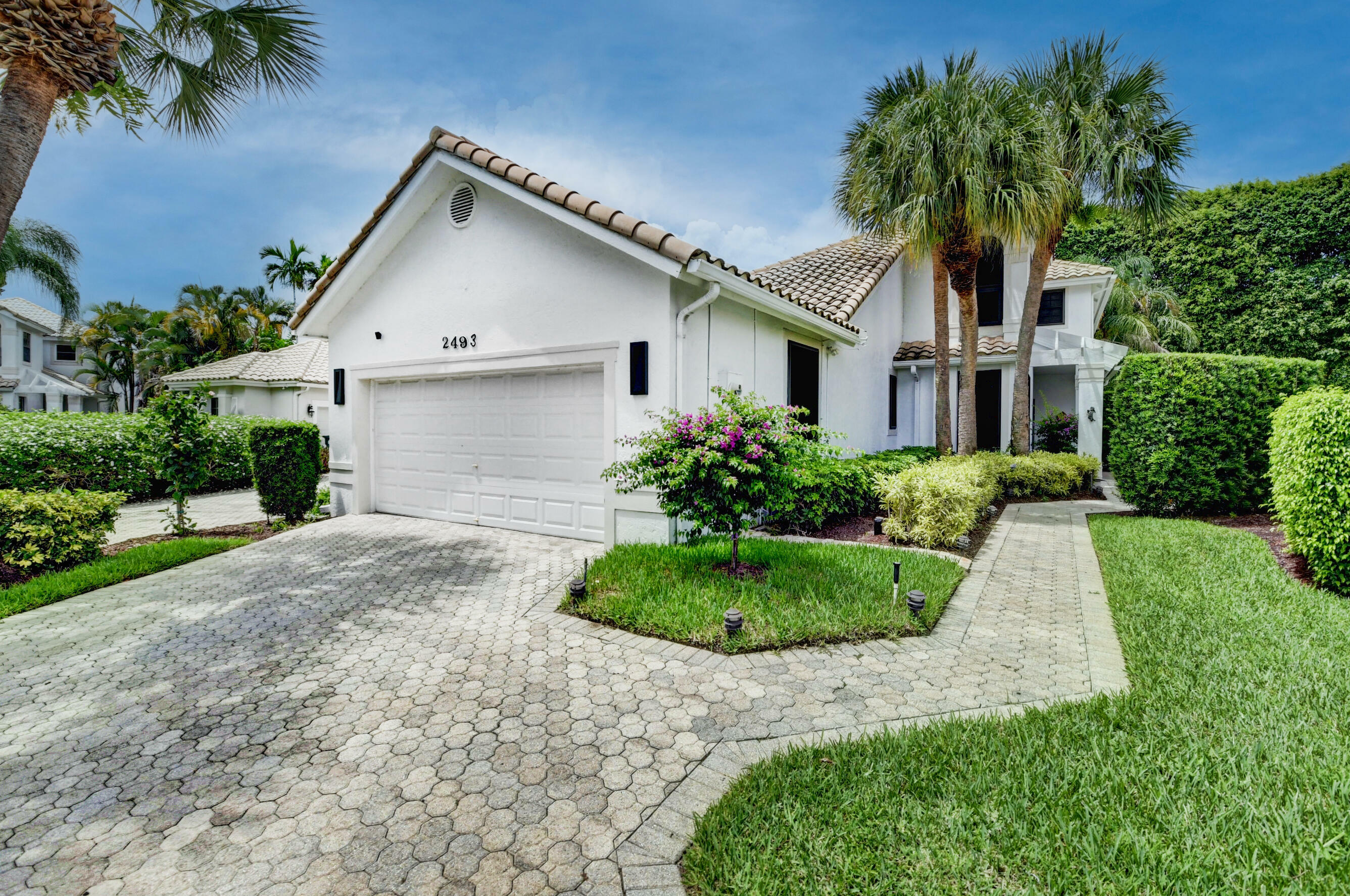 Property Photo:  2493 NW 64th Street  FL 33496 