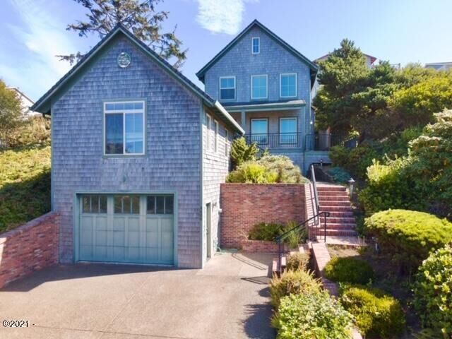 Property Photo:  4606 SW Beach Avenue  OR 97367 