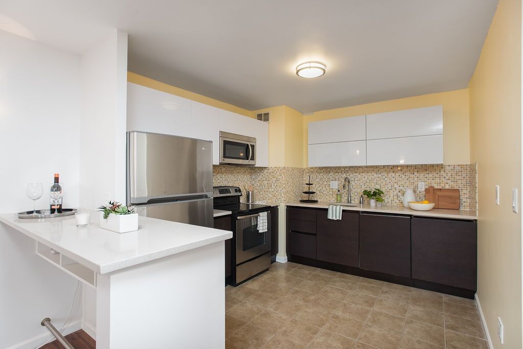 Property Photo:  100 Manhattan Ave 1911  NJ 07087 
