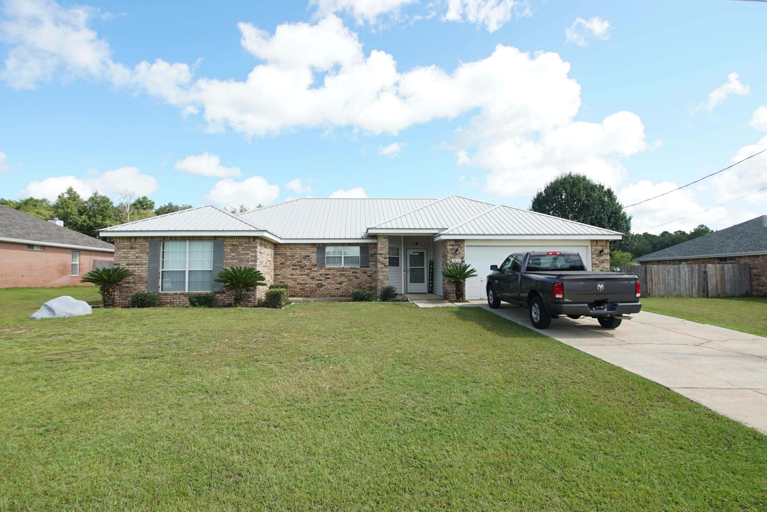 Property Photo:  4834 Young Road  FL 32539 