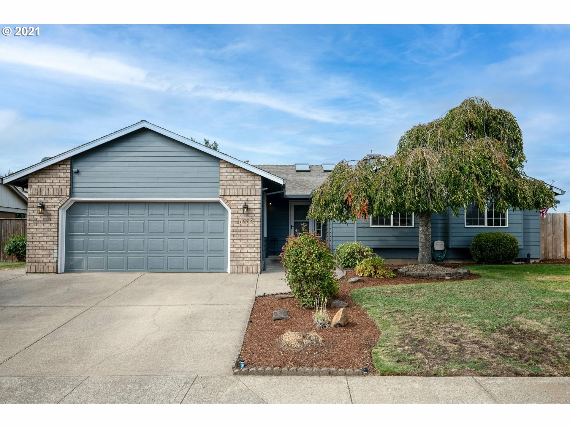 Property Photo: 1653 NE Grandhaven St OR 97128