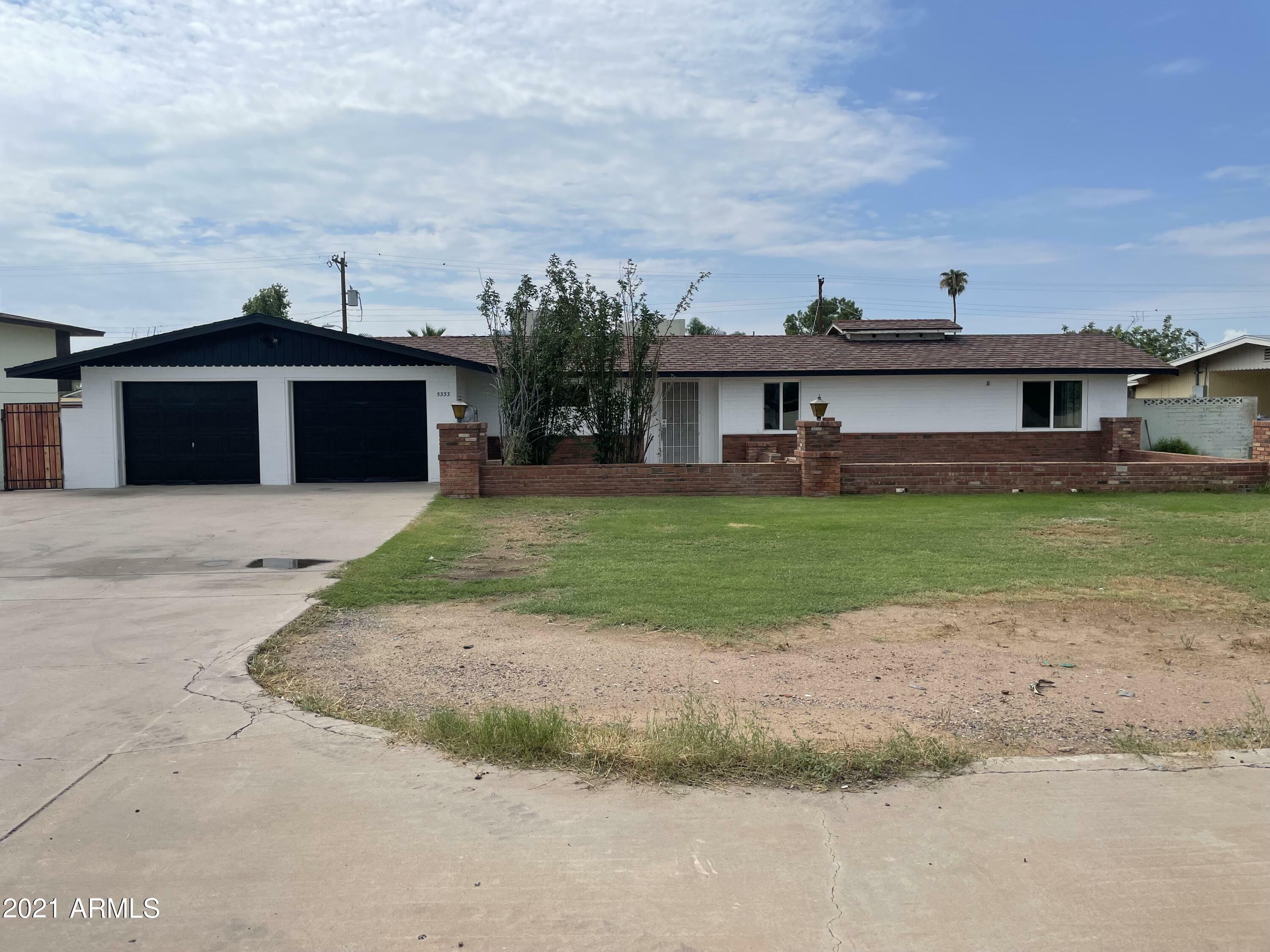 Property Photo:  5333 W Thomas Road  AZ 85031 