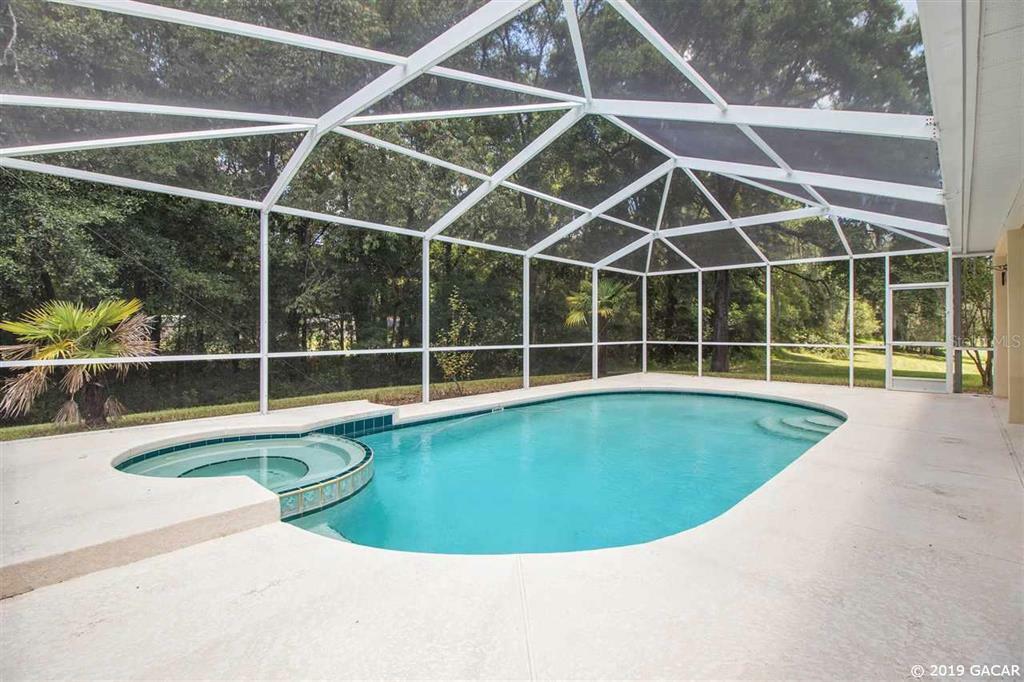 Property Photo:  9838 SW 37th Road  FL 32608 