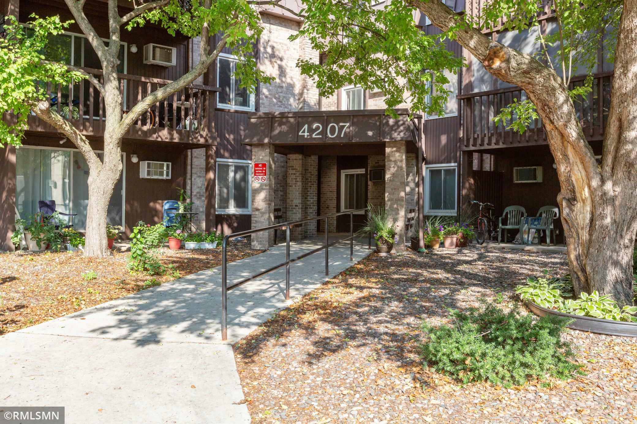 Property Photo: 4207 Lakeside Avenue N 328 MN 55429