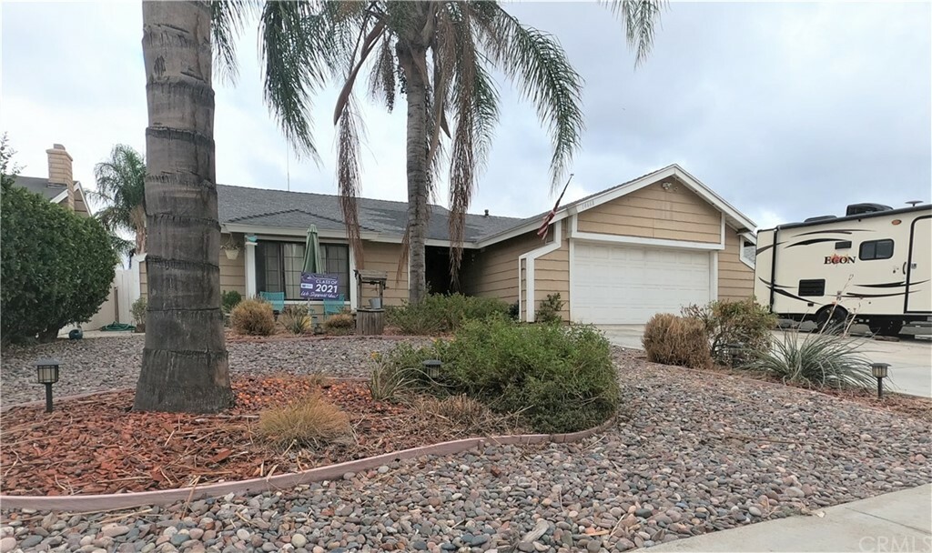 Property Photo:  14668 Blackbush  CA 92553 