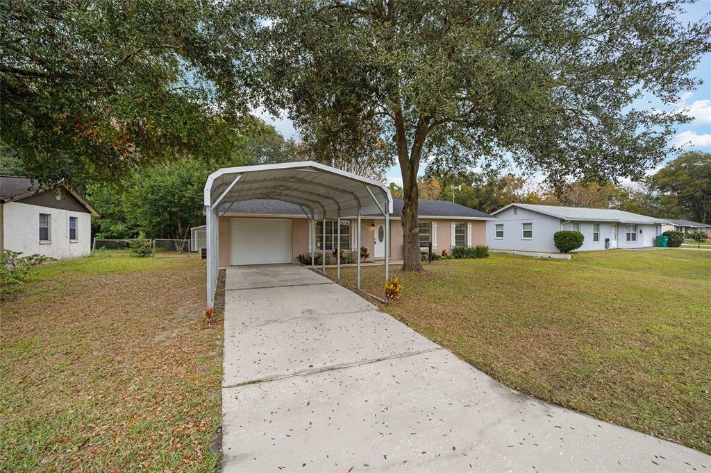 Property Photo:  910 Jacaranda Drive  FL 32159 