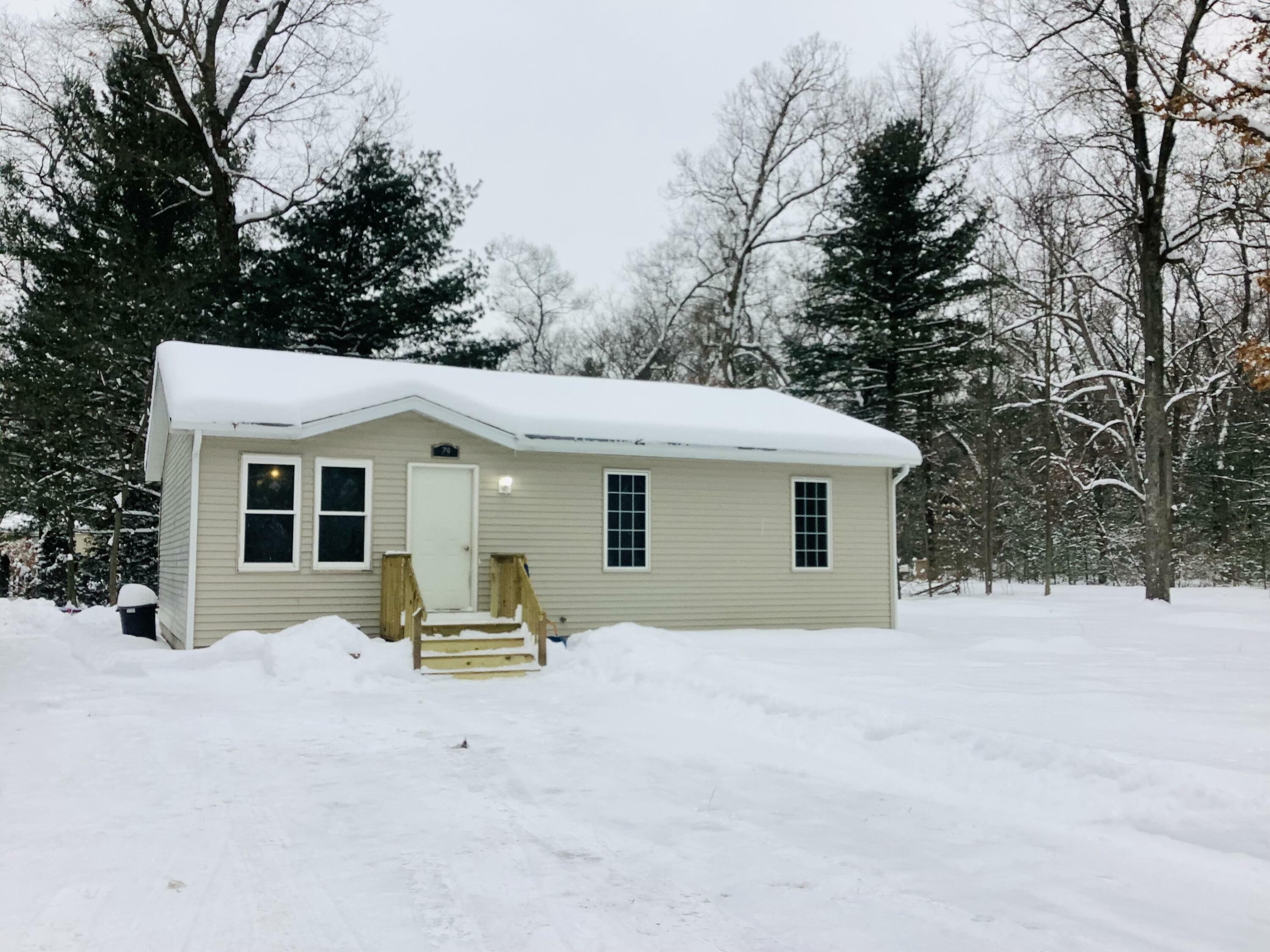 Property Photo:  79 W Raymond Road  MI 49457 