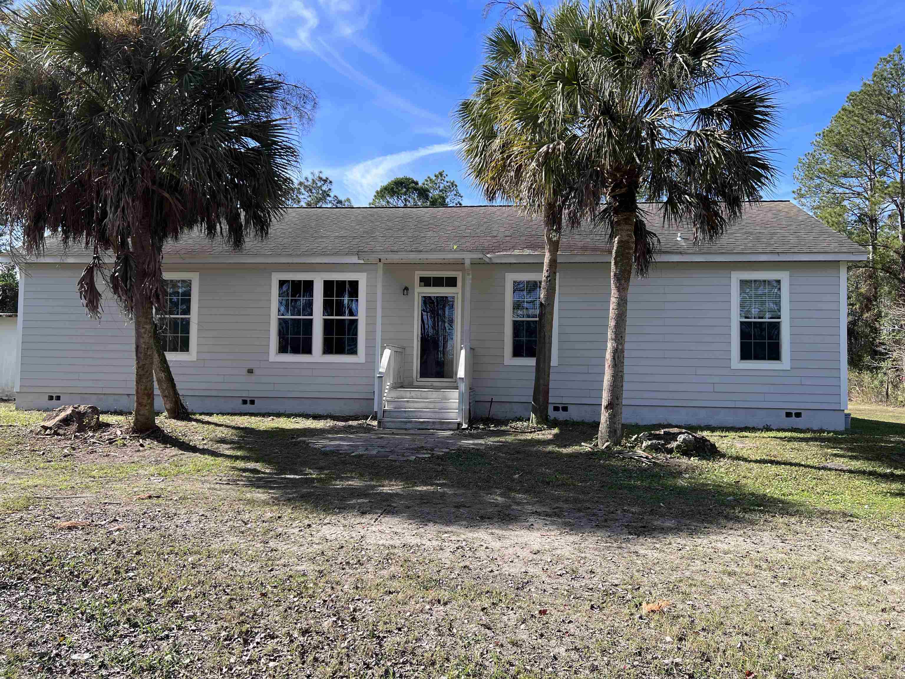 Property Photo:  10045 Amos Ave  FL 32145 