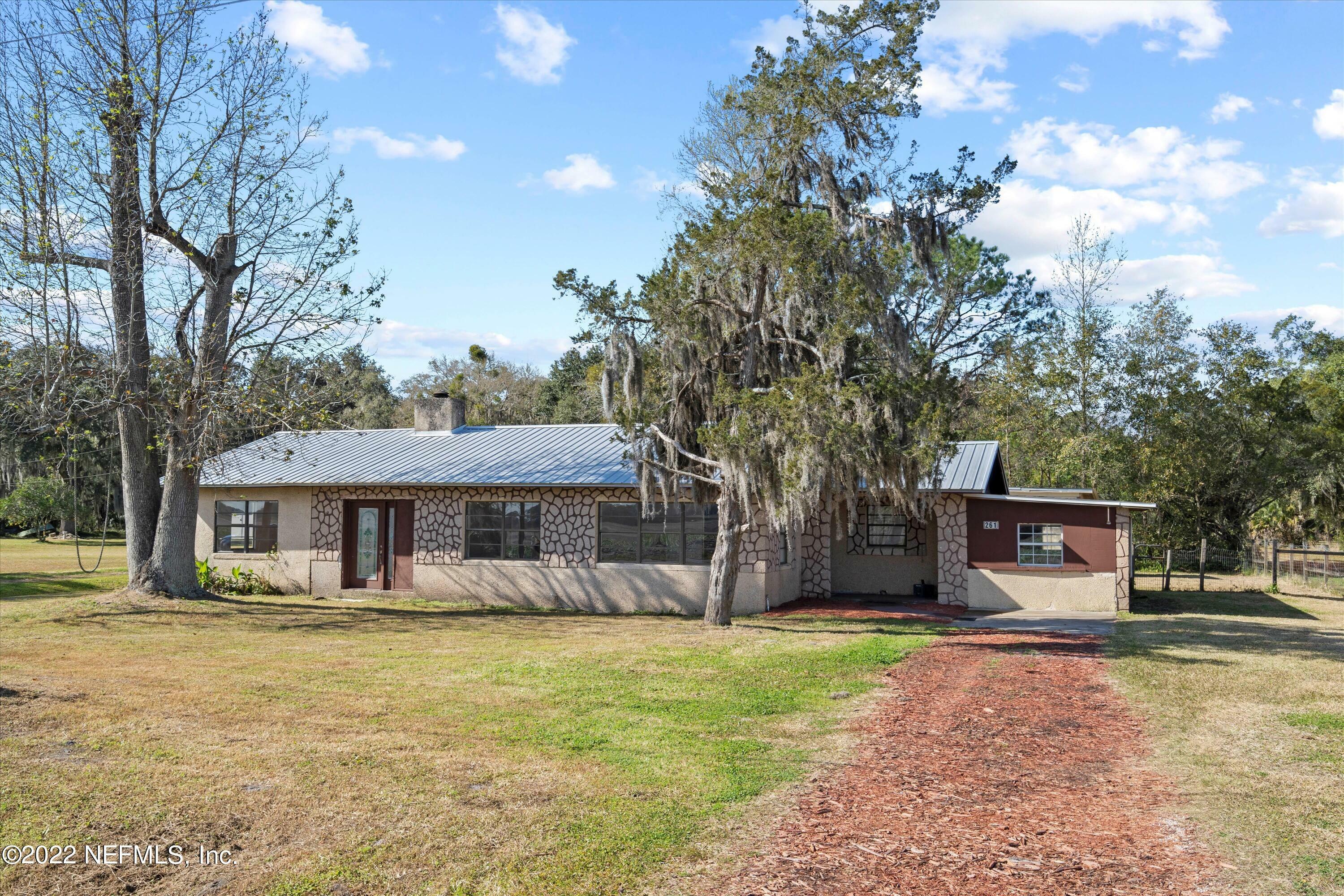 Property Photo:  261 E River Road  FL 32131 