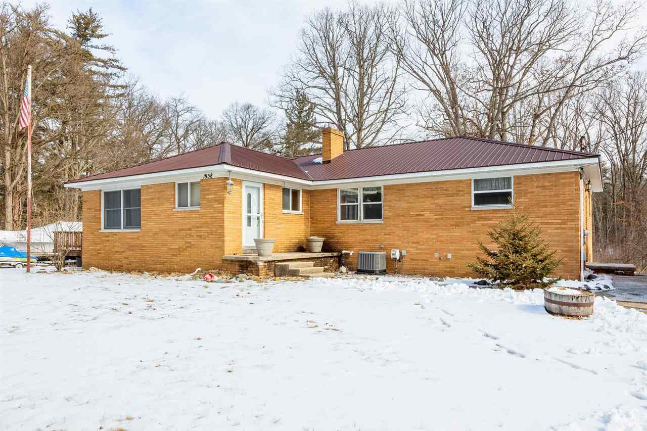 Property Photo:  1938 N Seven Mile  MI 48657 