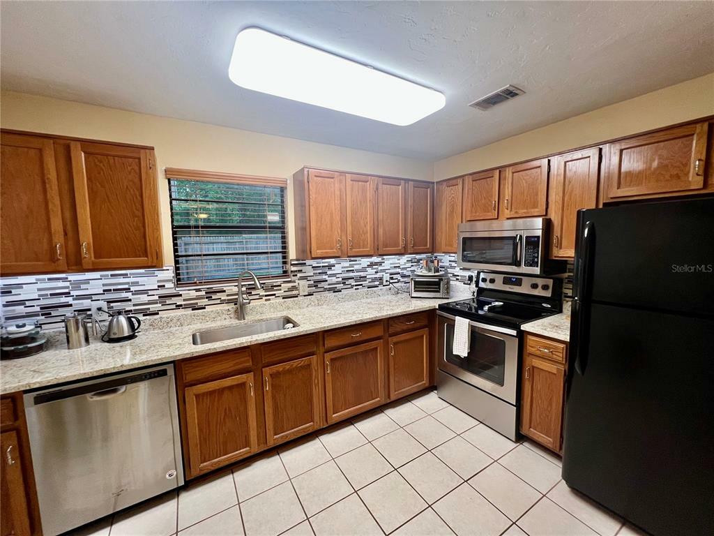 Property Photo:  2602 NW 104th Court  FL 32606 