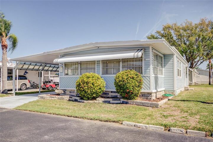 Property Photo:  18675 US Highway 19 N 202  FL 33764 