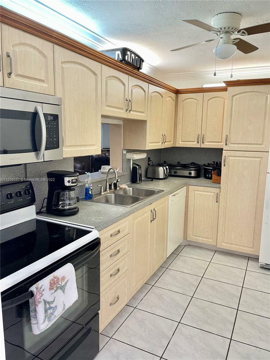 Property Photo: 4211 NW 41st St 408 FL 33319
