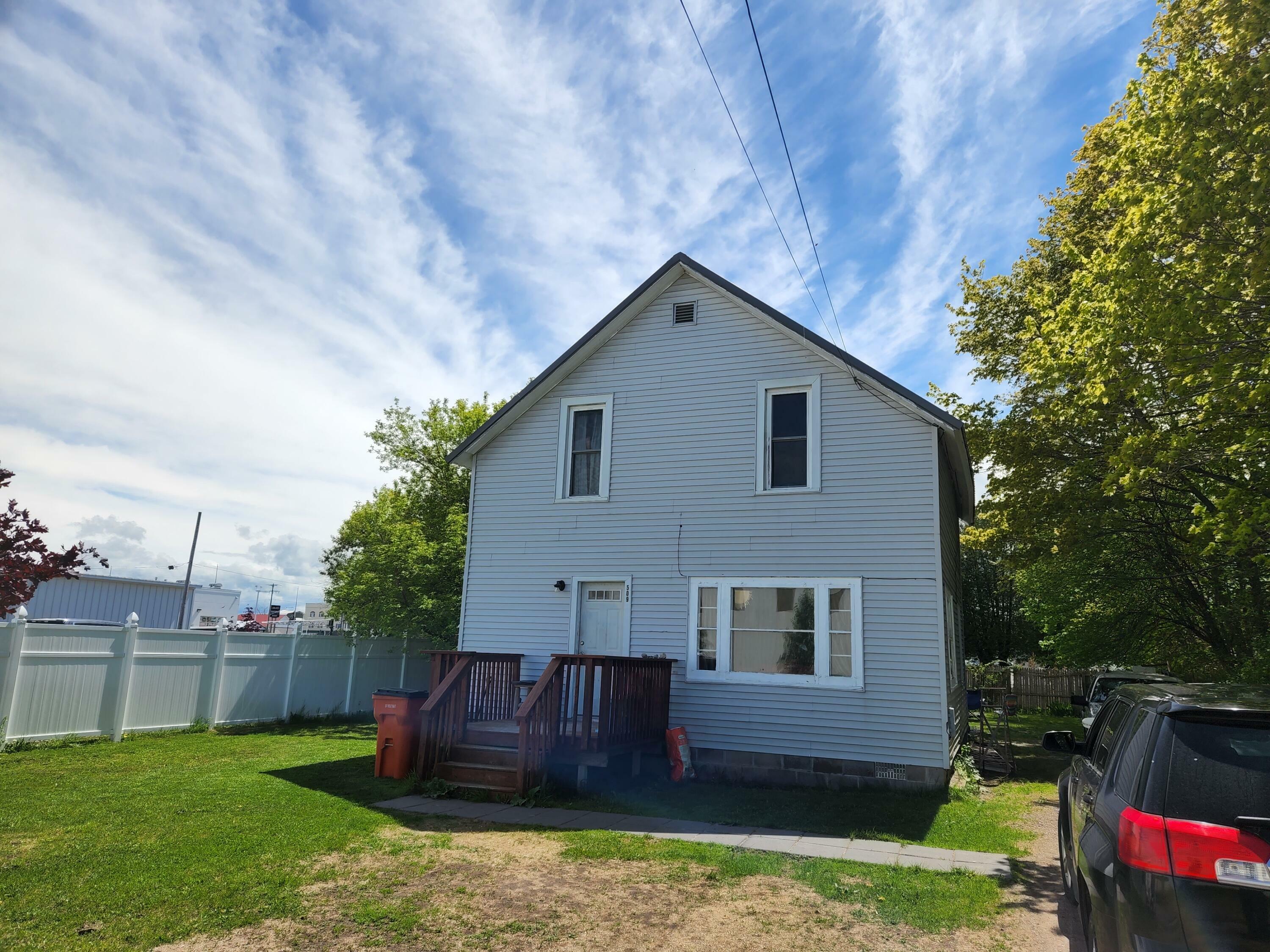 Property Photo:  509 W First Street  MI 49721 