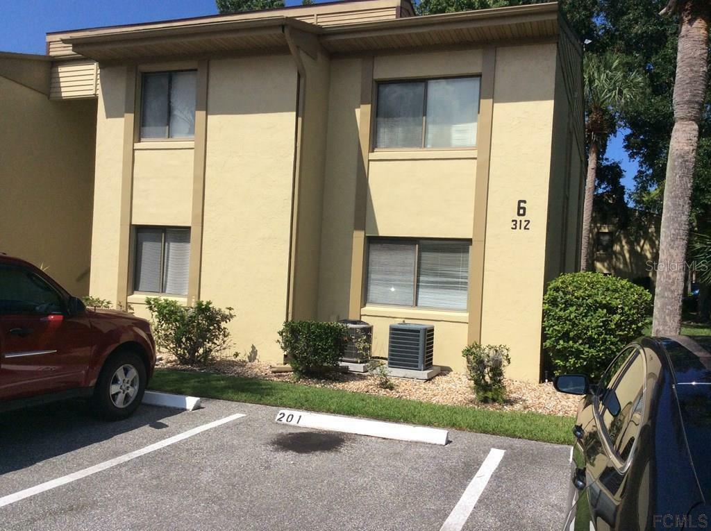 Property Photo:  312 Palm Coast Parkway 101  FL 32137 