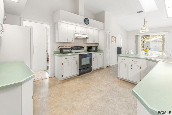 Property Photo:  1 Baron Way  FL 32137 