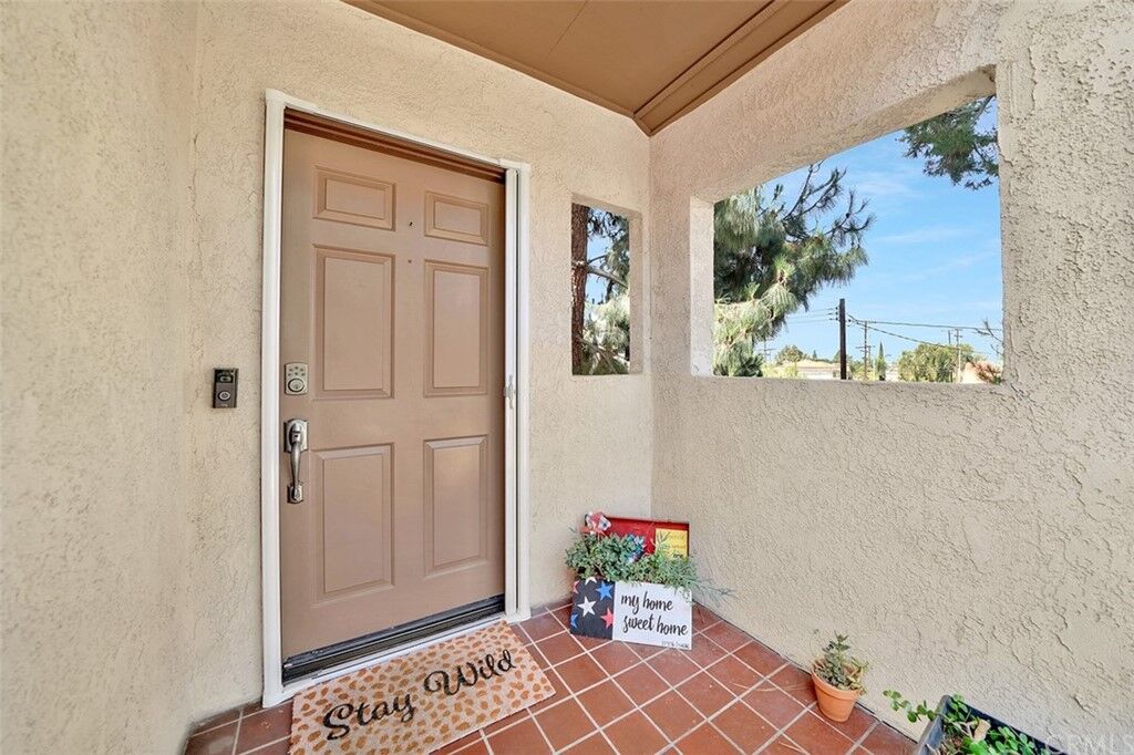 Property Photo:  10906 Seville Court 50  CA 92840 