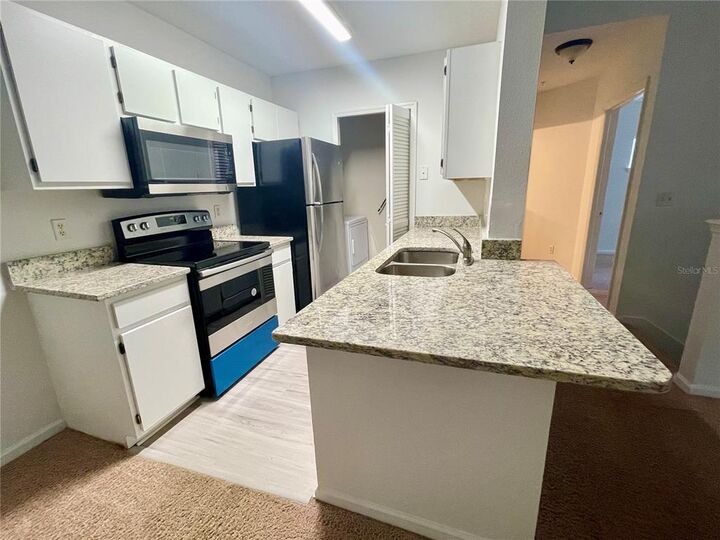 Property Photo:  4356 S Kirkman Road 512  FL 32811 