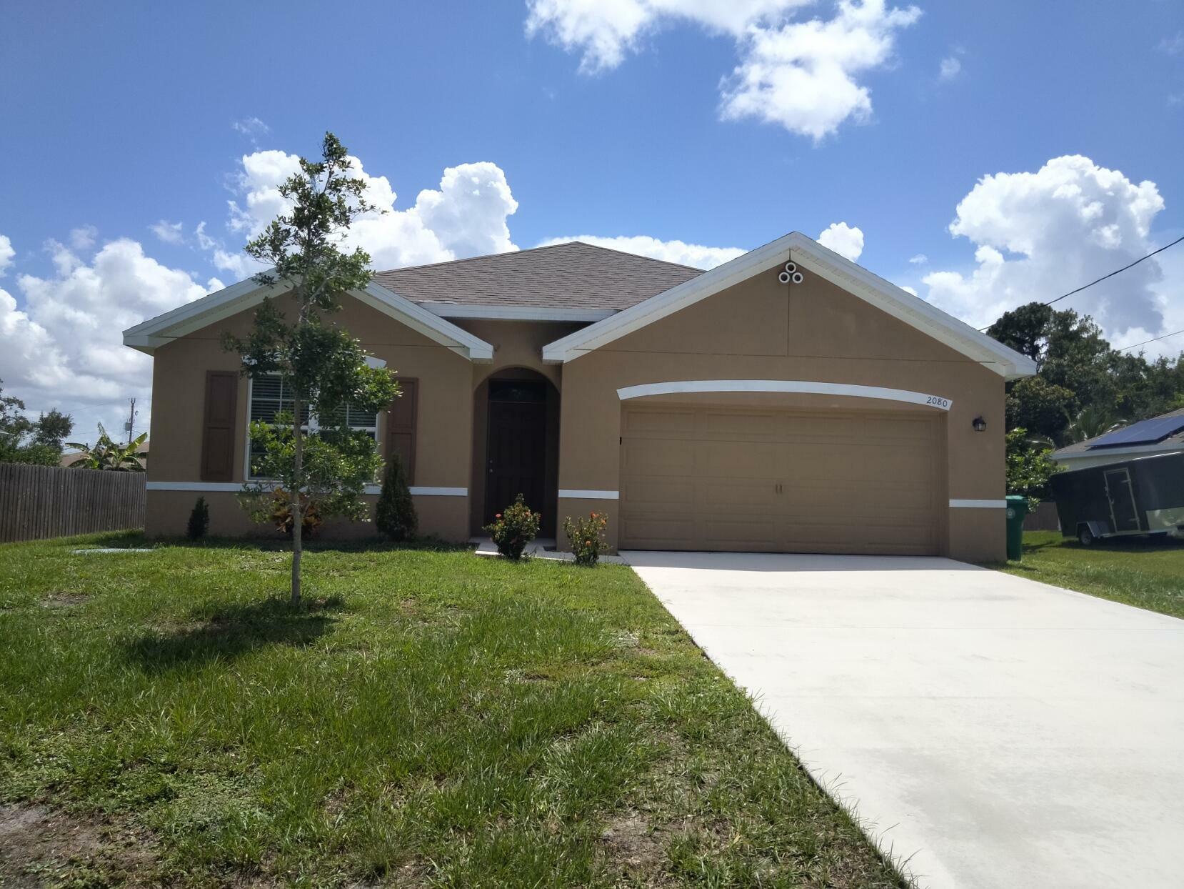 Property Photo:  2080 SW Leafy Road  FL 34953 