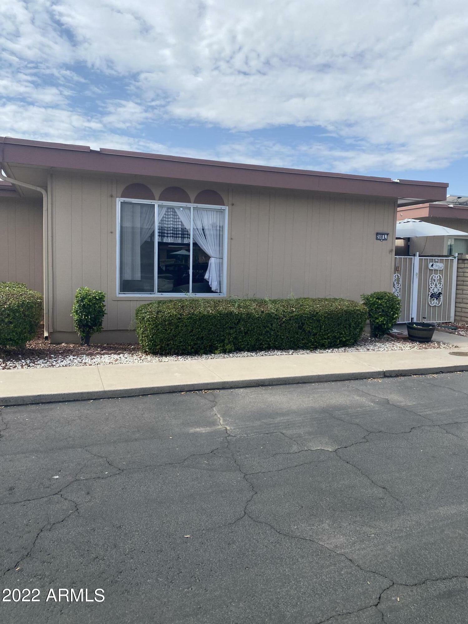 Property Photo:  13208 N 98th Avenue L  AZ 85351 