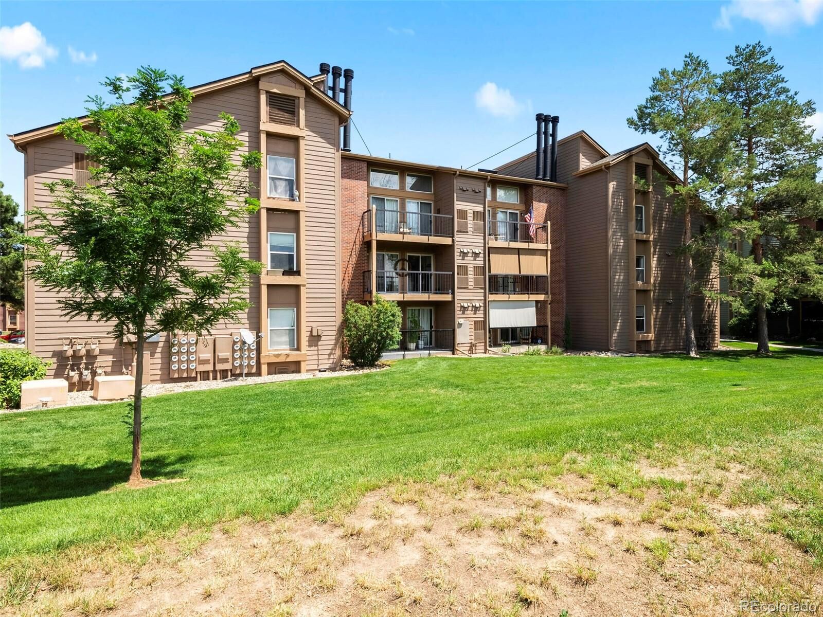 Property Photo:  4899 S Dudley Street I14  CO 80123 