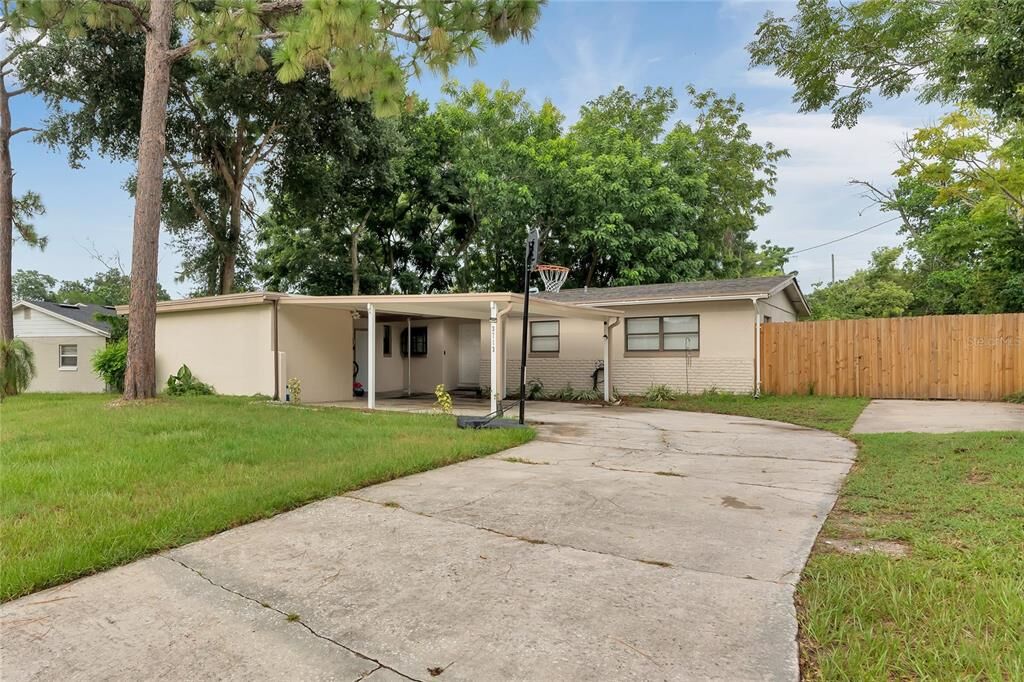 Property Photo:  3713 Wade Rd Road  FL 32808 