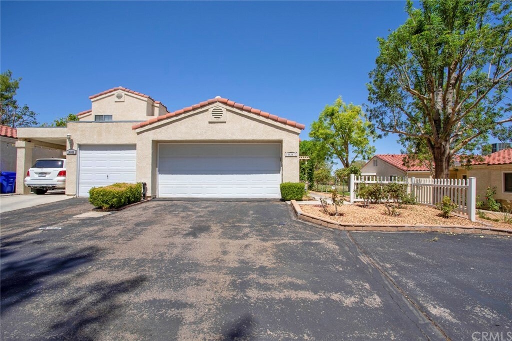 Property Photo:  14836 Clubhouse Drive C  CA 92342 