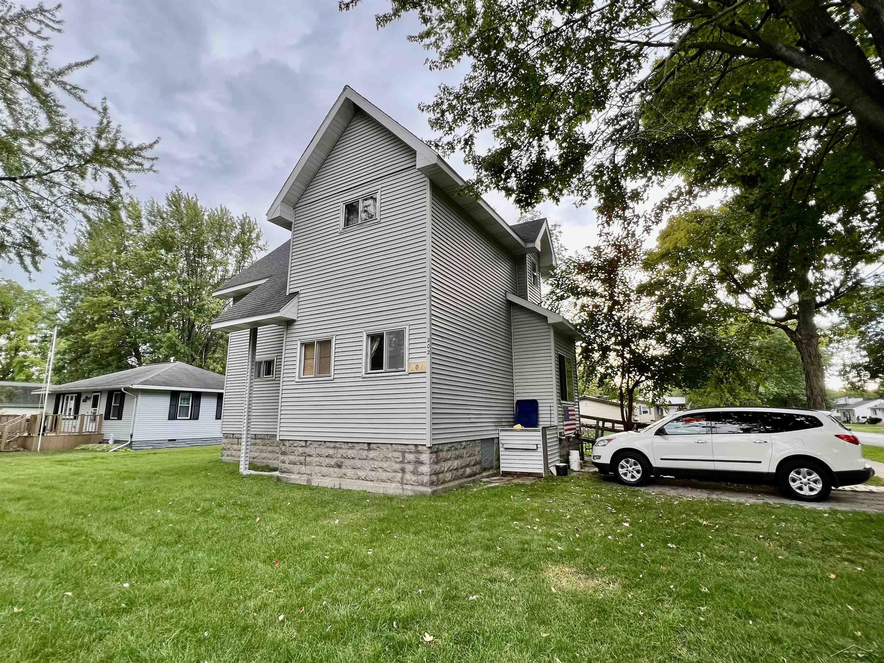 Property Photo:  202 Ingraham Street  MI 48708 