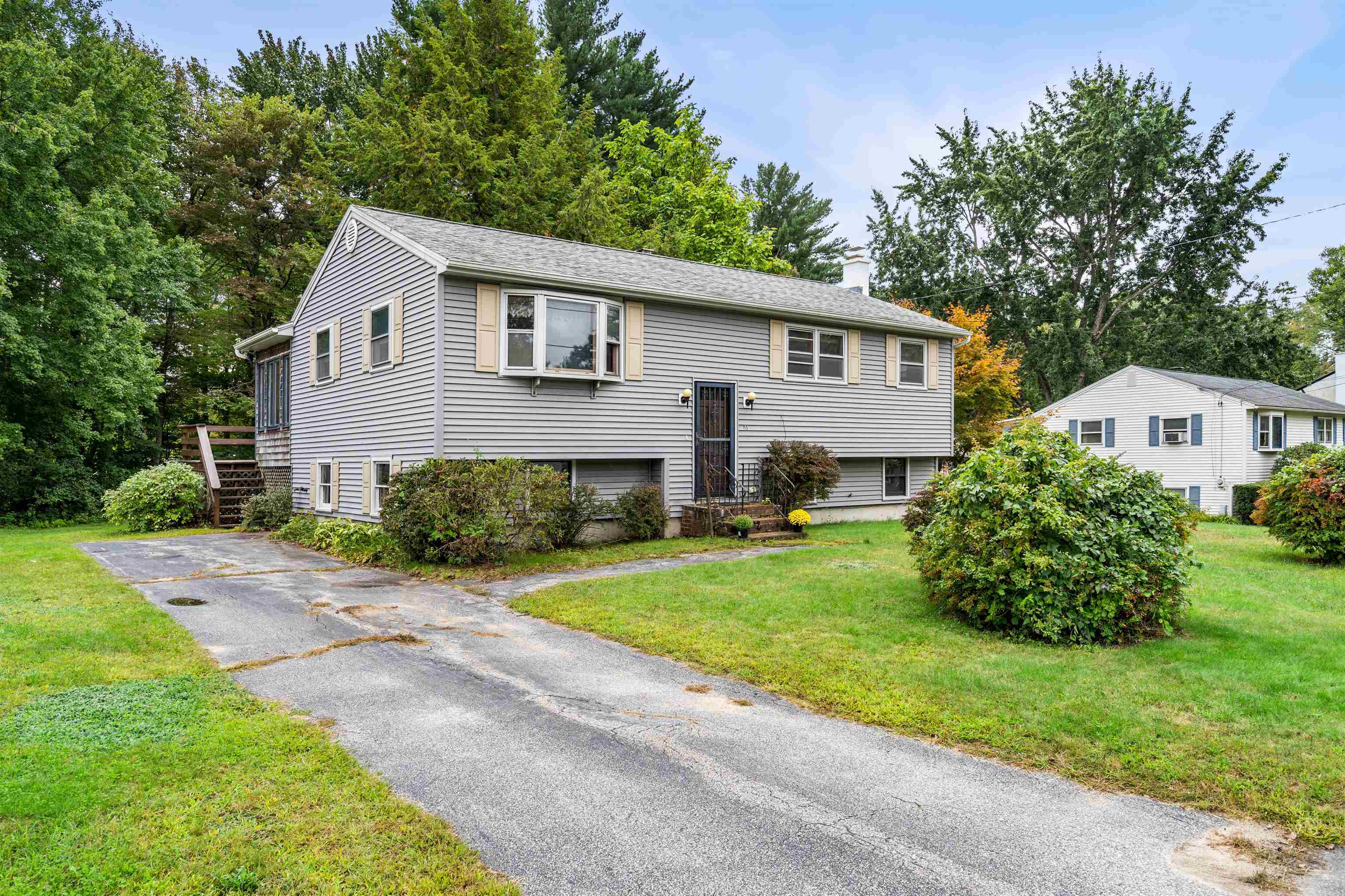 Property Photo: 115 Lakeside Drive NH 03104