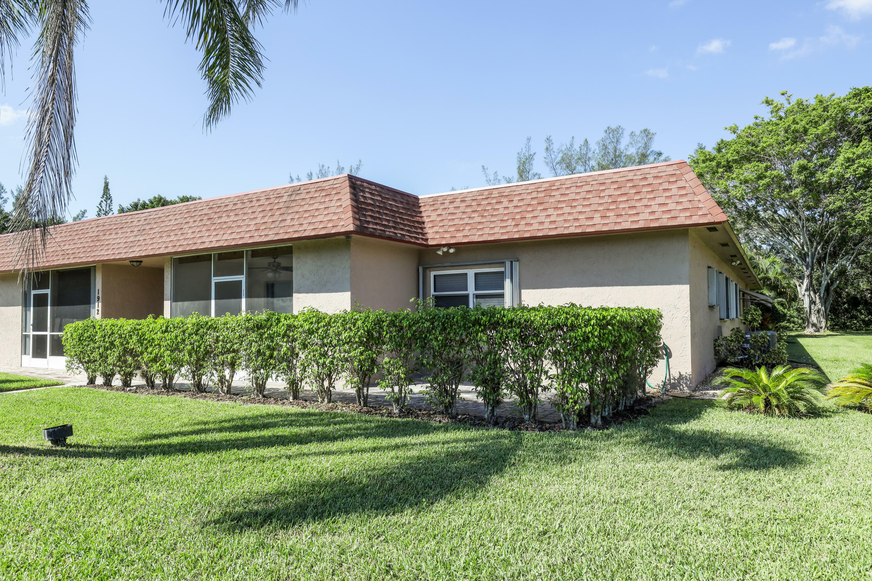 Property Photo:  1912 Palmland Drive D  FL 33436 