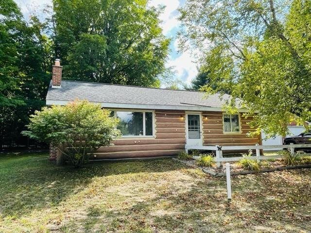 Property Photo:  7741 Mile Point Drive  MI 49622 