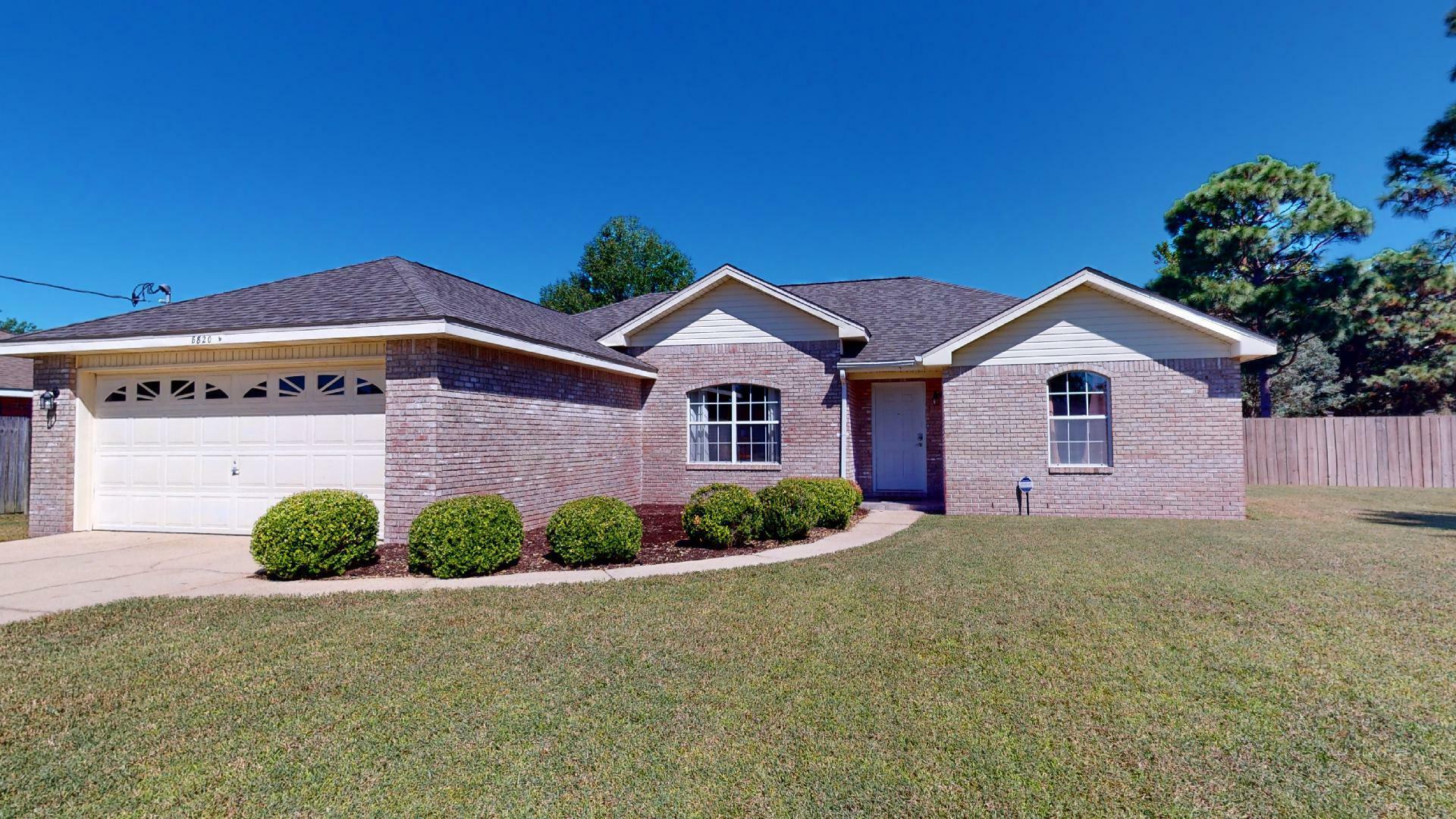 Property Photo:  8820 Pebble Brook Drive  FL 32566 