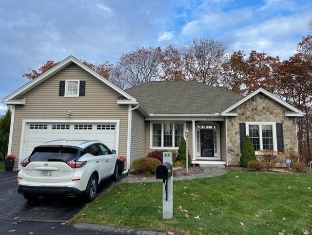 Property Photo: 215 Pleasant Pond Way NH 03102